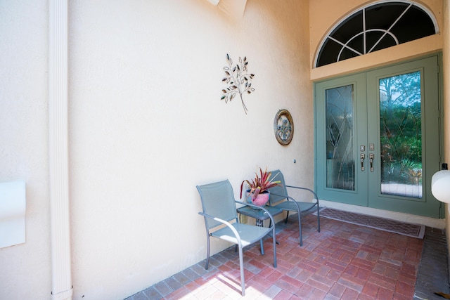 property entrance featuring french doors