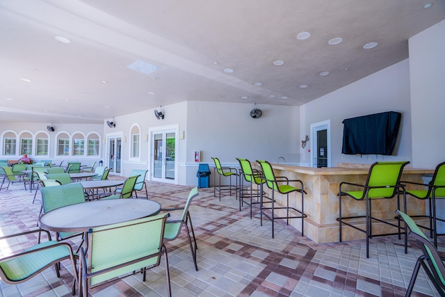 view of patio with exterior bar and french doors