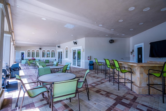 view of patio / terrace featuring french doors and an outdoor bar