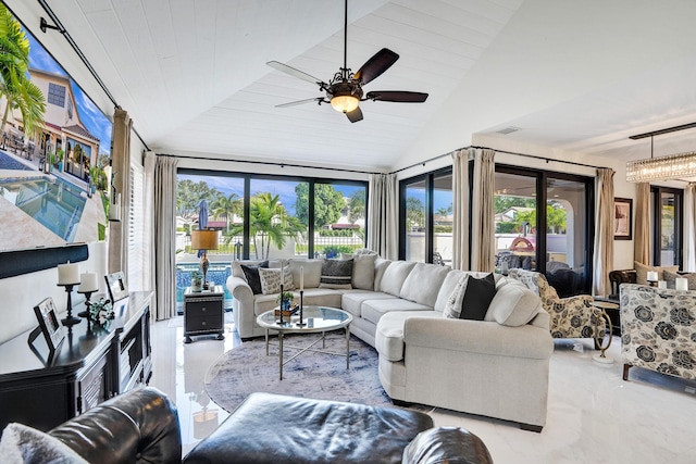 living room with lofted ceiling, a wealth of natural light, wooden ceiling, and ceiling fan