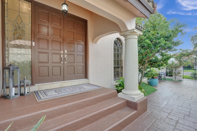 doorway to property with covered porch