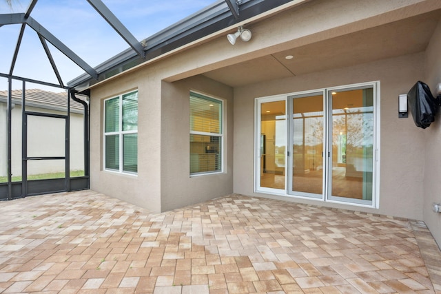 unfurnished sunroom with a skylight