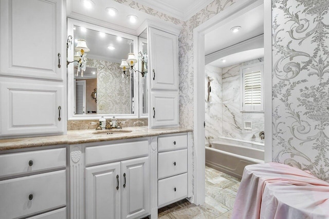 bathroom featuring vanity, tiled shower / bath combo, and ornamental molding