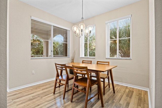 bedroom featuring ceiling fan, hardwood / wood-style floors, and a textured ceiling