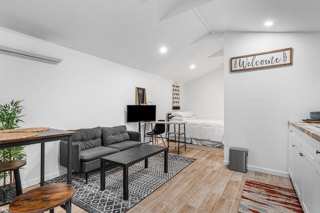 living room with lofted ceiling and a wall unit AC