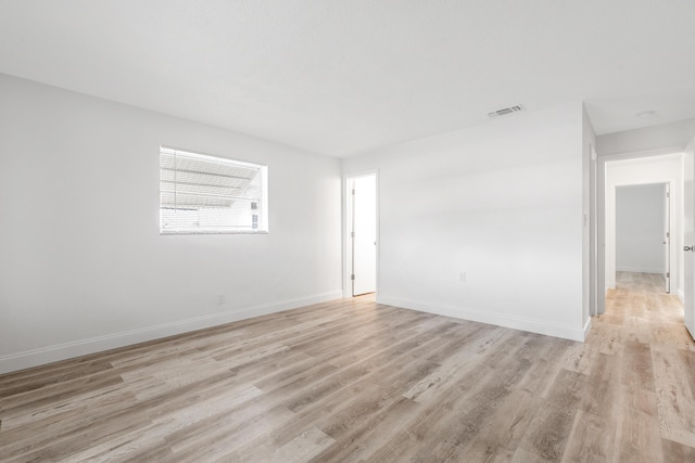 empty room featuring light hardwood / wood-style floors