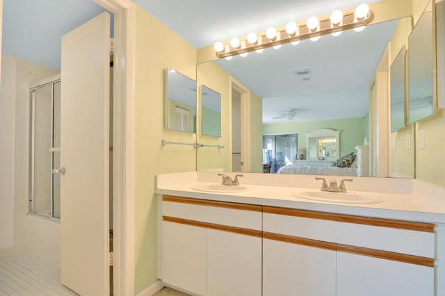 bathroom with ceiling fan and vanity