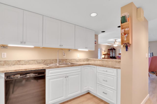 kitchen with white cabinetry, sink, ceiling fan, and black dishwasher