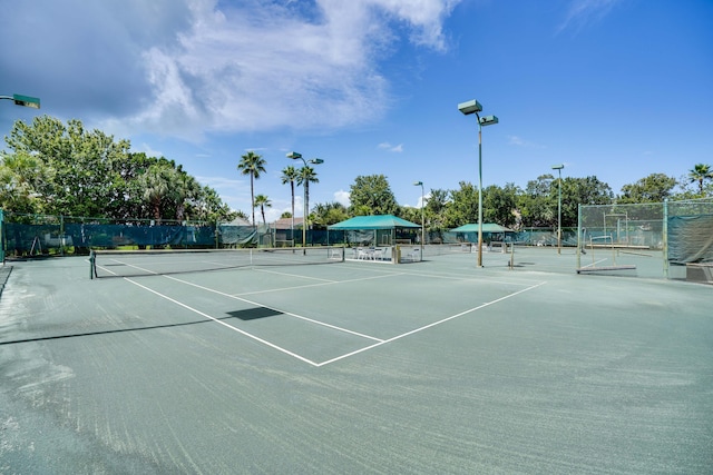 view of sport court with fence