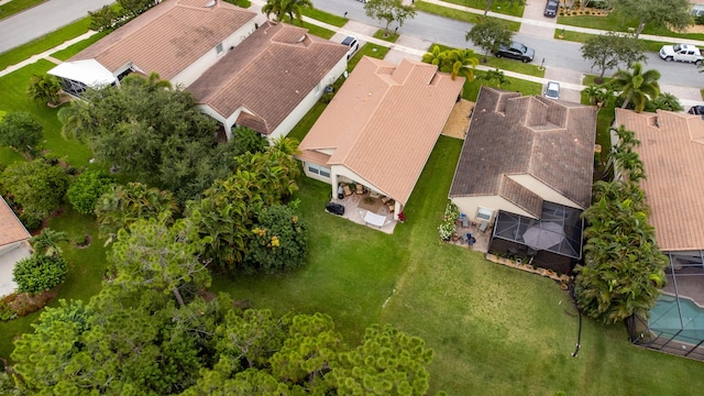 birds eye view of property with a residential view