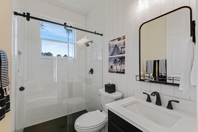 bathroom featuring decorative backsplash, vanity, toilet, and a shower with door