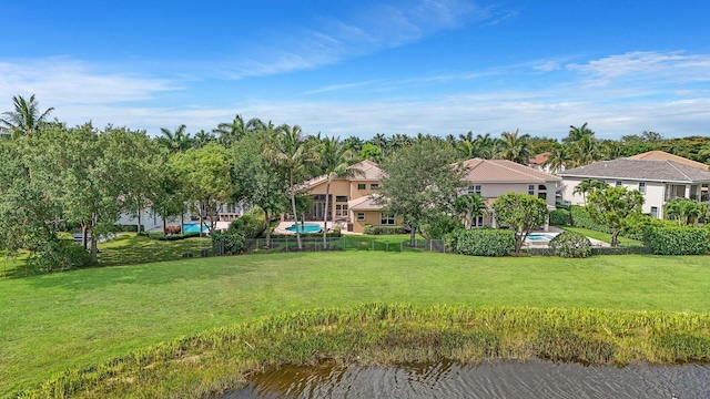 exterior space with a water view