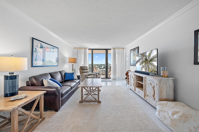 tiled living room featuring ornamental molding, a wall of windows, and a textured ceiling