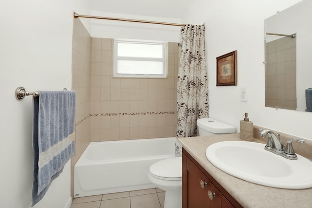 full bathroom featuring tile patterned floors, vanity, toilet, and shower / tub combo with curtain