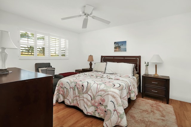 bedroom featuring ceiling fan and light hardwood / wood-style floors