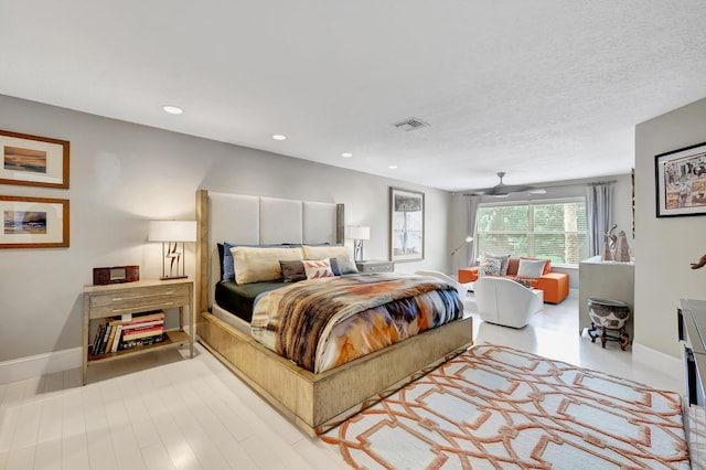 bedroom featuring a textured ceiling