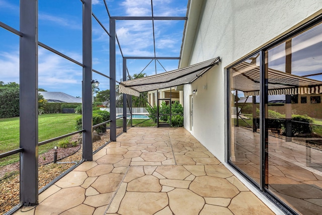 unfurnished sunroom featuring a mountain view