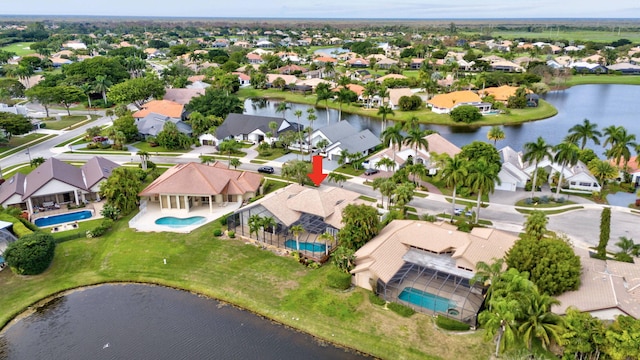 drone / aerial view featuring a water view