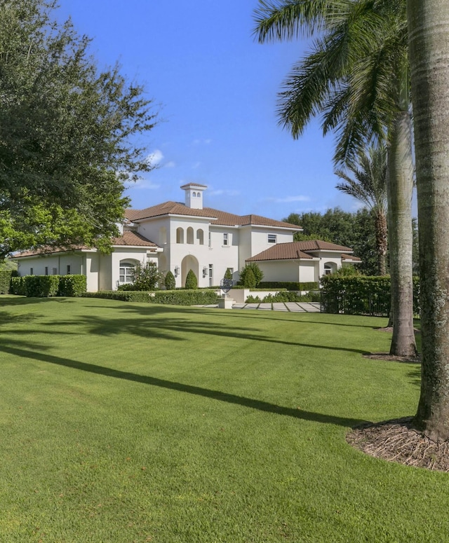 exterior space with a front lawn