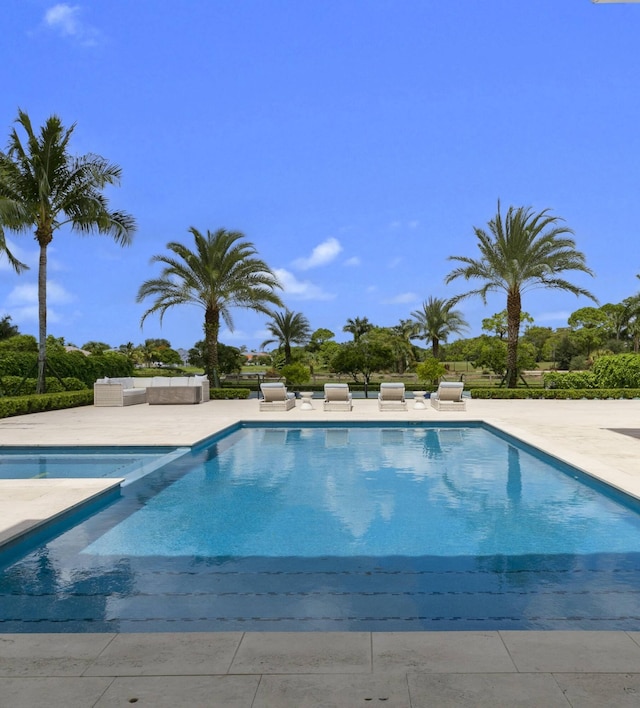 view of pool with a patio