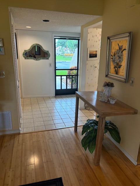 entryway featuring light hardwood / wood-style floors