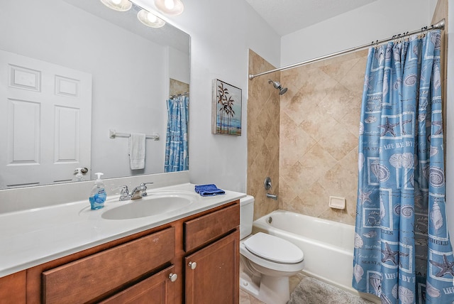 full bathroom with shower / bath combo, vanity, and toilet