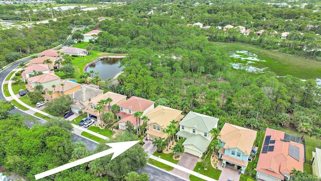 drone / aerial view with a water view