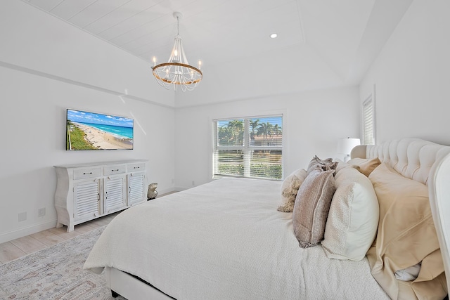 bedroom with a notable chandelier