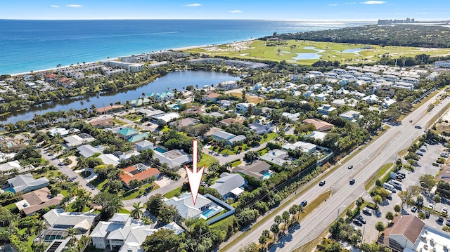 drone / aerial view with a water view