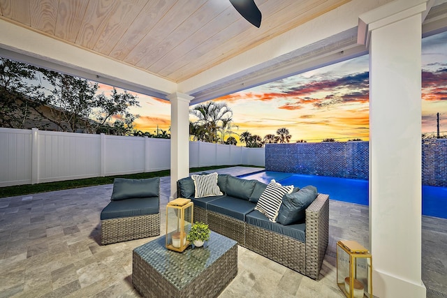 patio terrace at dusk with ceiling fan