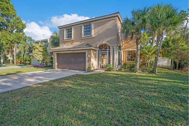 view of front facade with a garage and a front yard