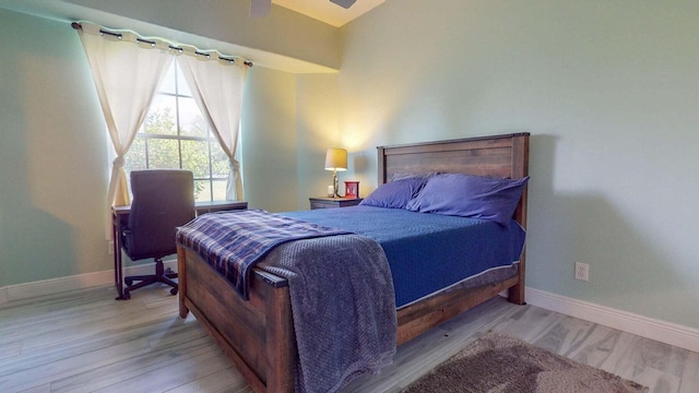 bedroom with light hardwood / wood-style flooring