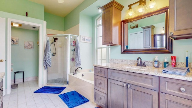 bathroom with vanity and plus walk in shower