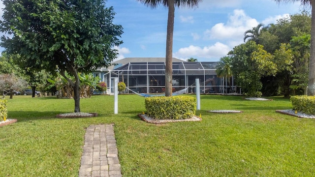 view of yard with a lanai