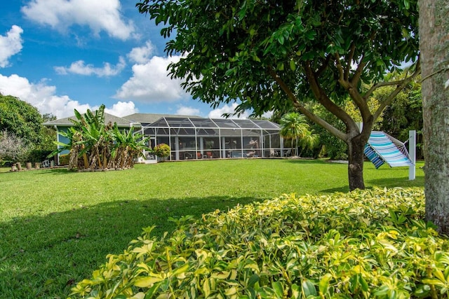 view of yard with a lanai