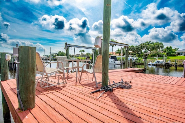 view of dock with a water view