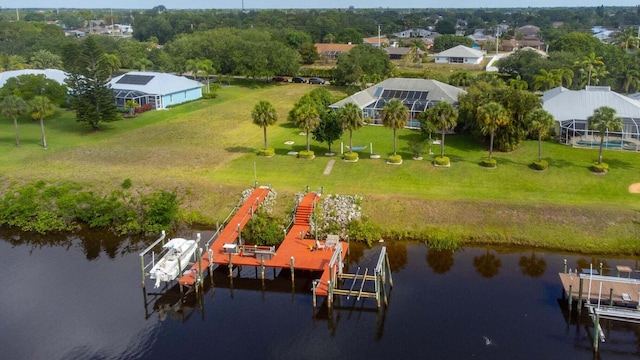 bird's eye view with a water view