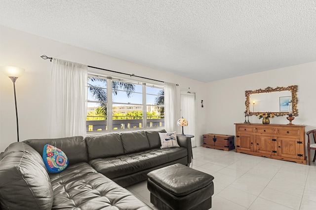 tiled living room with a textured ceiling