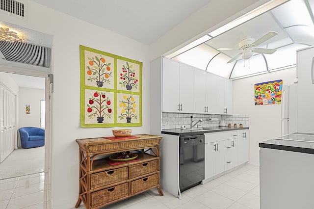 kitchen with sink, ceiling fan, black dishwasher, white fridge, and white cabinetry