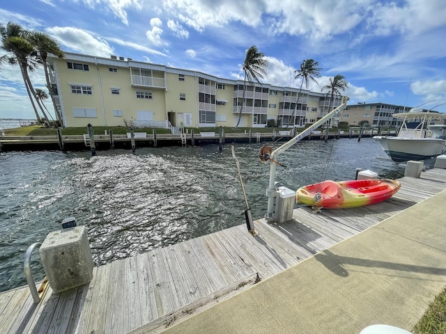 dock area featuring a water view