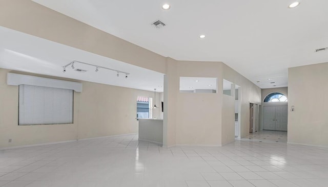 empty room featuring light tile patterned floors