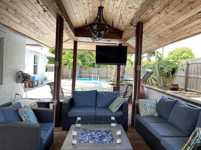 view of patio / terrace with outdoor lounge area and a fenced in pool