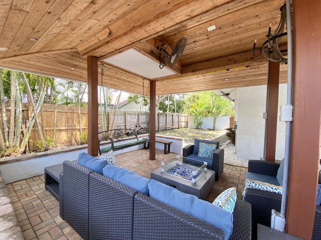 view of patio with a fire pit