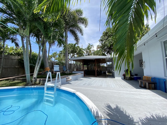 view of pool featuring a gazebo and a patio area