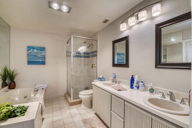 full bath featuring a shower stall, tile patterned flooring, a tub with jets, double vanity, and toilet