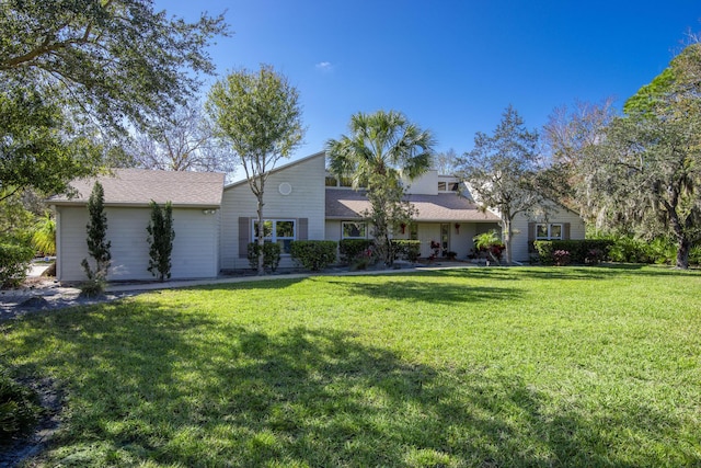 view of front of home with a front lawn