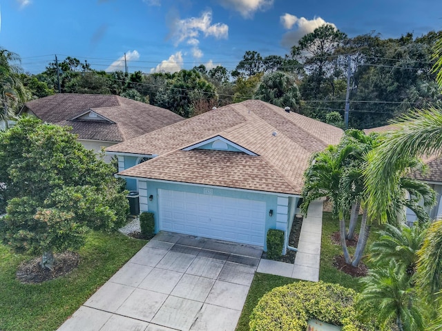 view of front of property with a garage