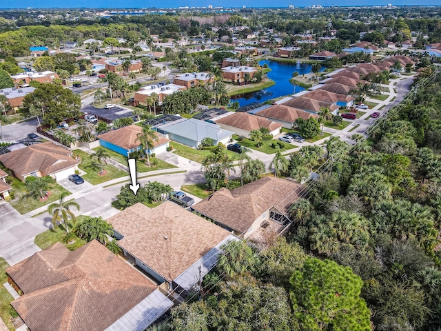 drone / aerial view featuring a water view