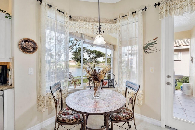 dining room with tile patterned floors