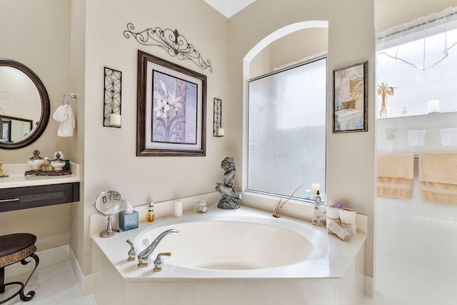 bathroom featuring plus walk in shower, tile patterned floors, and plenty of natural light